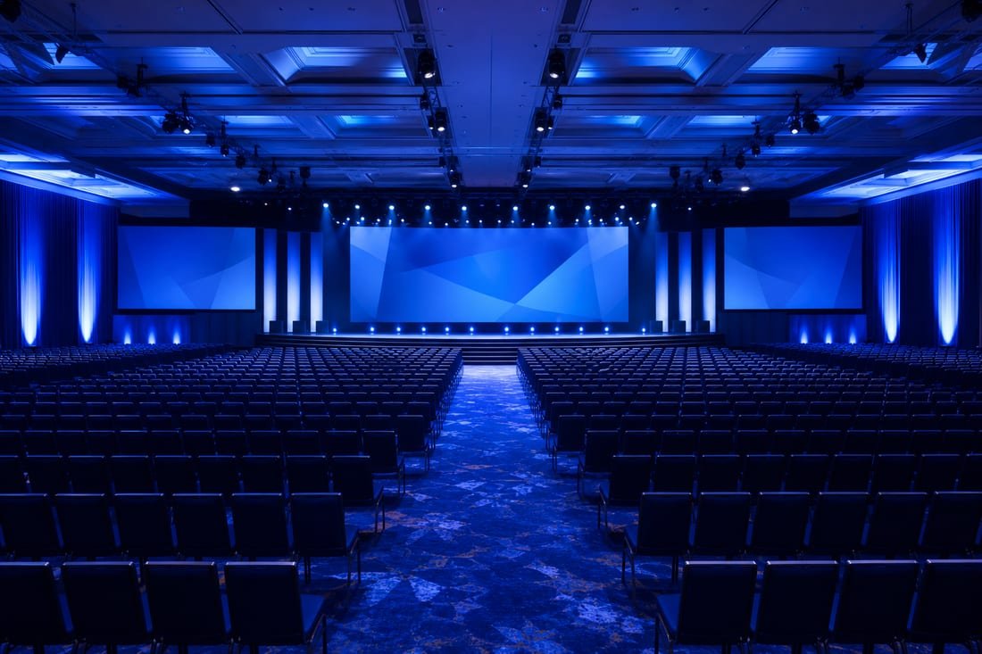Celebration lights over a live event stage